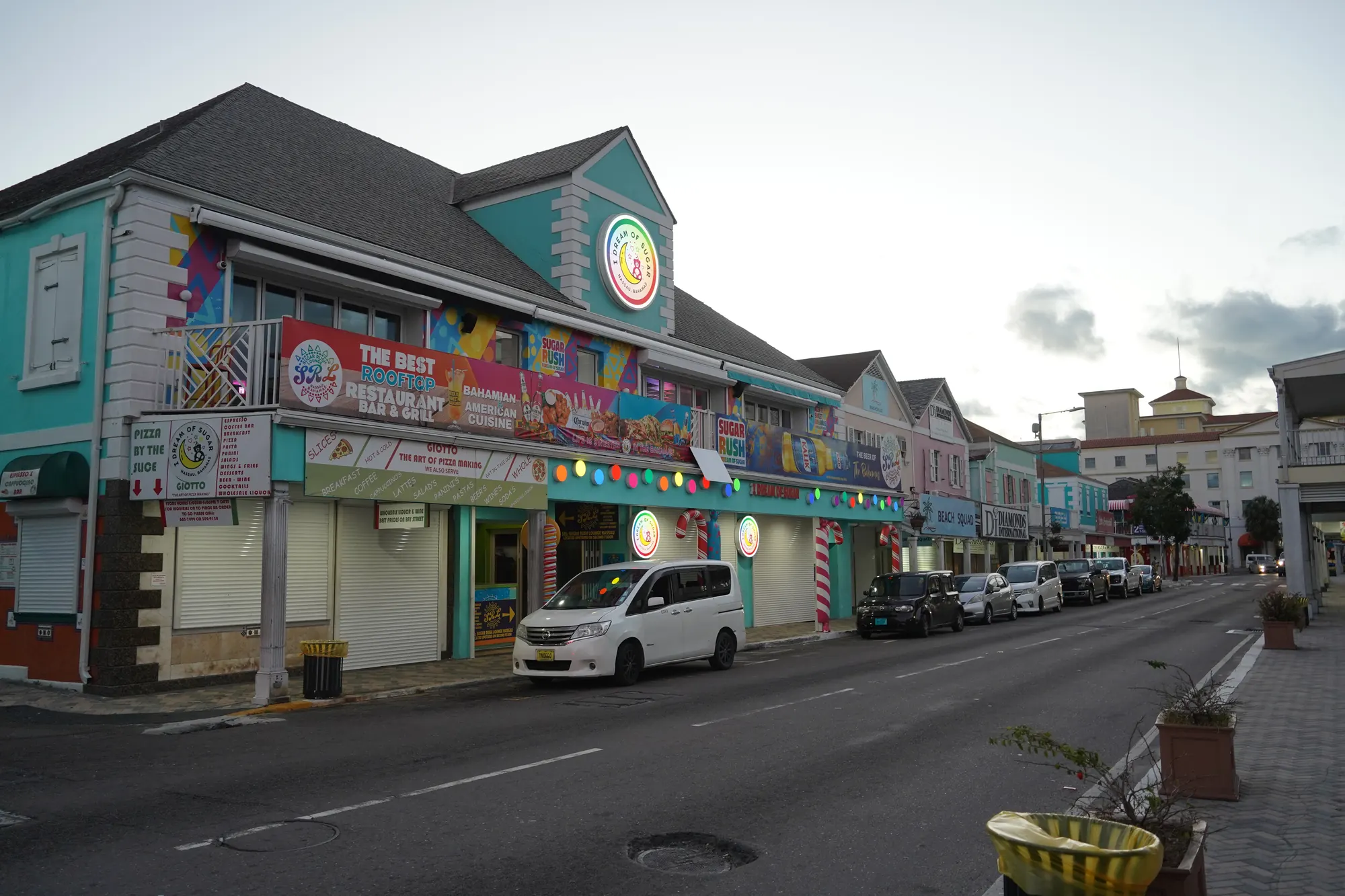 Colourful colonial shopfronts on Bay Street in downtown Nassau